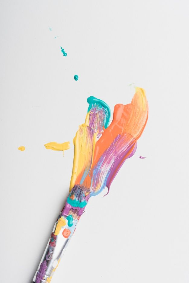 an artistically painted toothbrush on a white surface