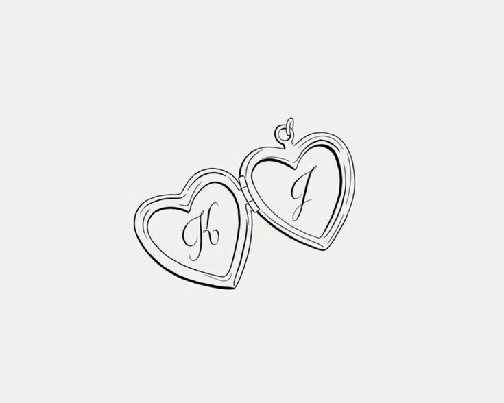 two heart shaped lockes with initials on them