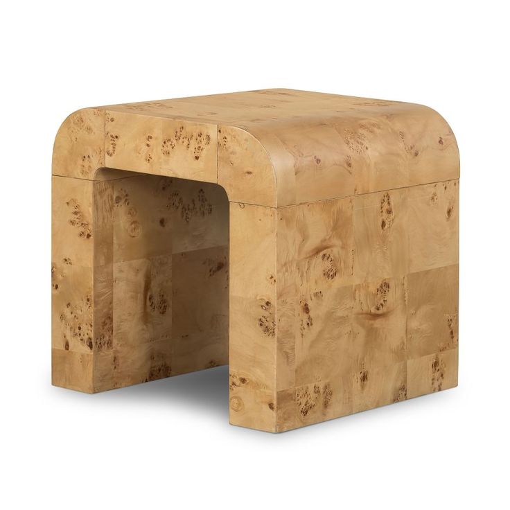 a small stool made out of wood on a white background