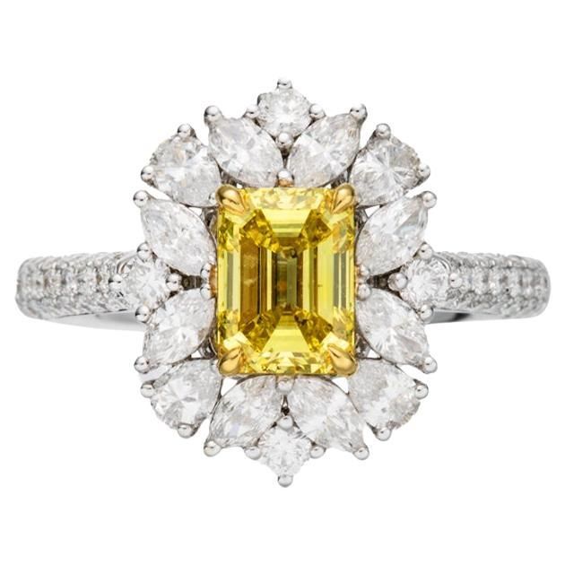 a yellow and white diamond ring