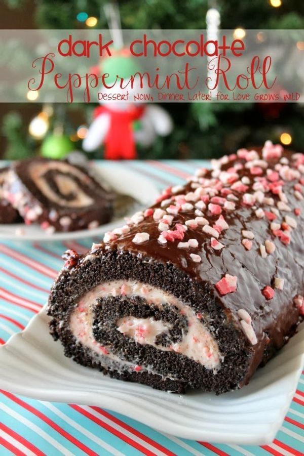 chocolate peppermint roll on a plate with christmas tree in the background