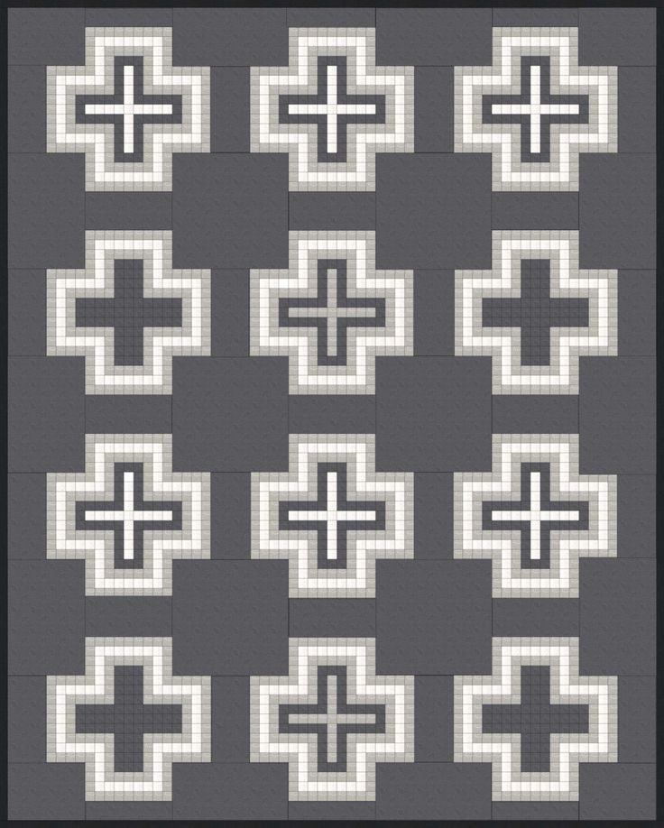 a black and white quilt with many different crosses on the front, one in grey