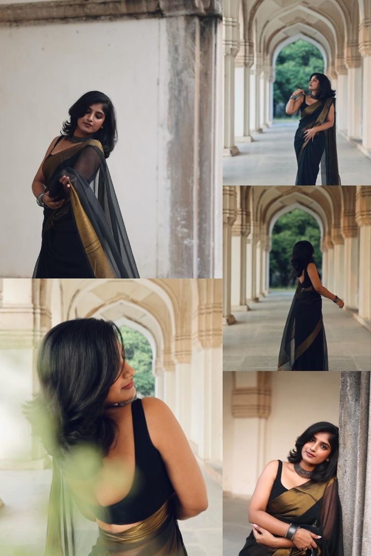 the woman is posing in her black and gold sari, while she poses for pictures