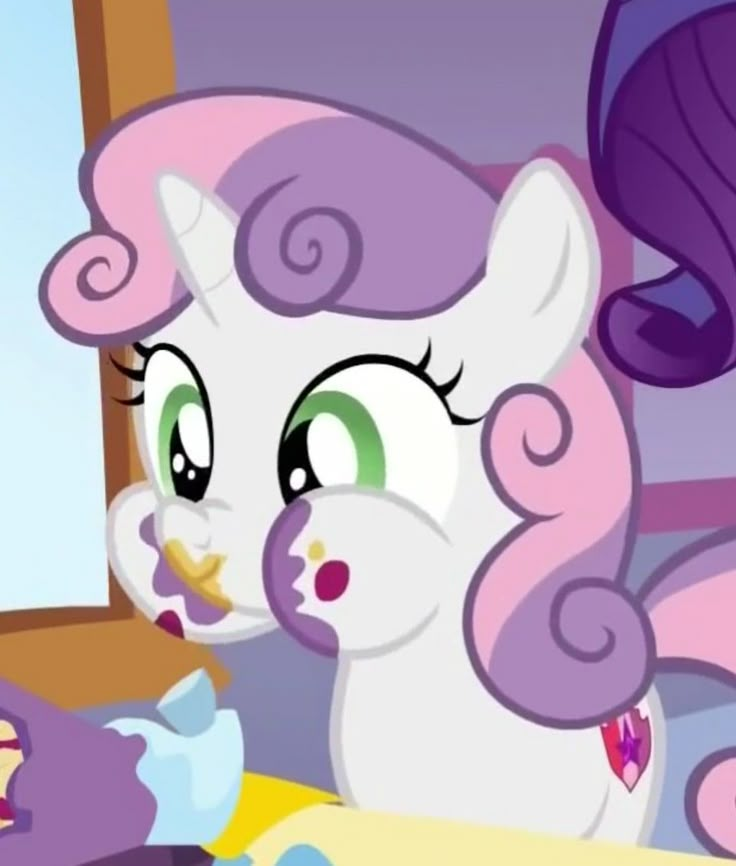 the pinkie is looking at her reflection in the mirror