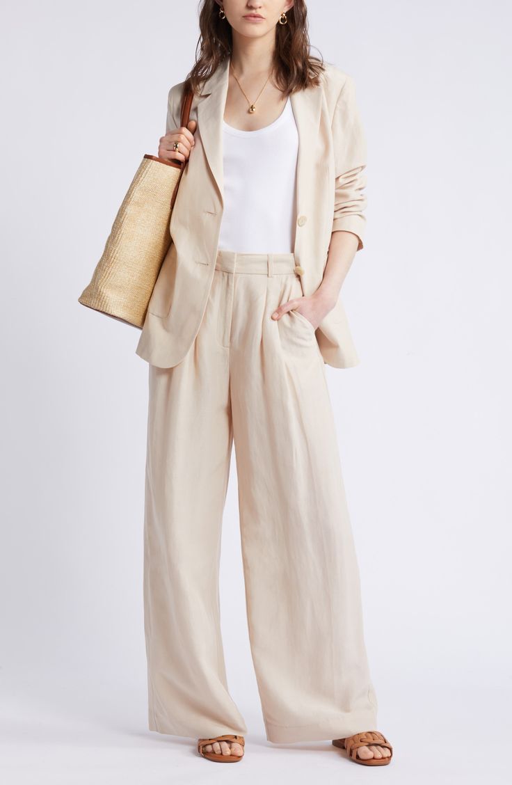 Add casual polish in linen-kissed pants tailored with neat pleats and flowy wide legs for a touch of comfort. Zip fly with hook-and-bar closure 45% cupro, 28% linen, 27% lyocell Machine wash, line dry Imported Wide Leg Pants Linen, Chic Linen Bottoms With Welt Pockets, Chic Linen Pants For Spring, Spring Neutral Linen Wide Leg Pants, Spring Linen Wide Leg Pants, Chic Flax Linen Pants, Spring Wide-leg Flax Pants, Chic Neutral Wide Leg Linen Pants, Chic Flax Wide Leg Pants For Work