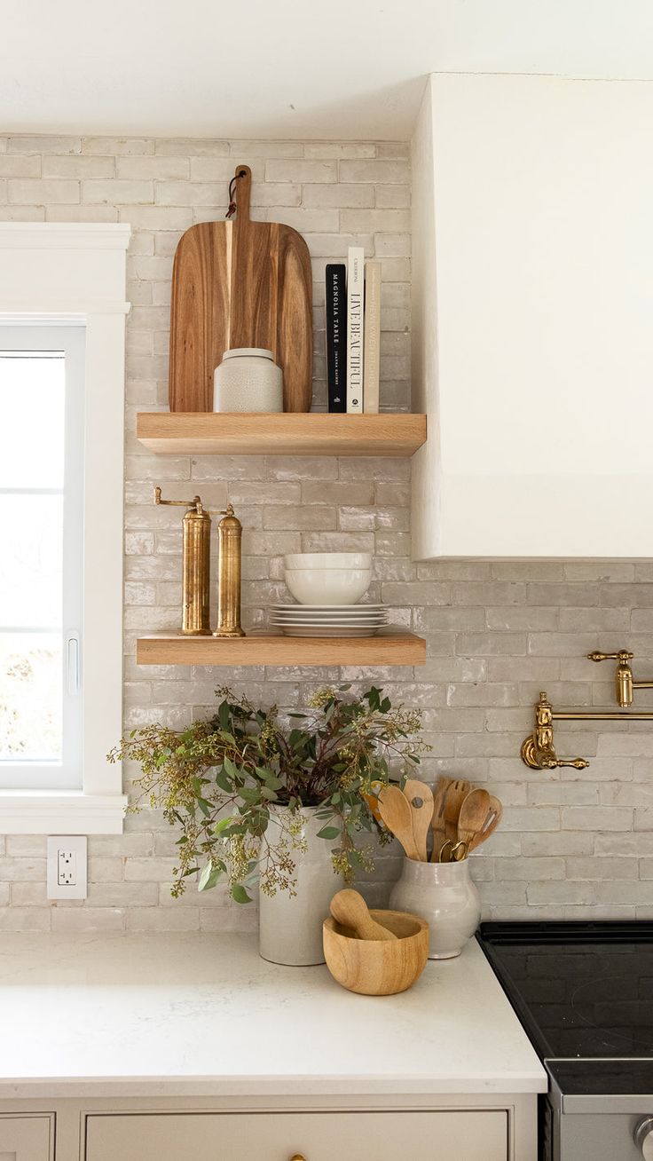 the kitchen counter is clean and ready to be used as a shelf for cooking utensils