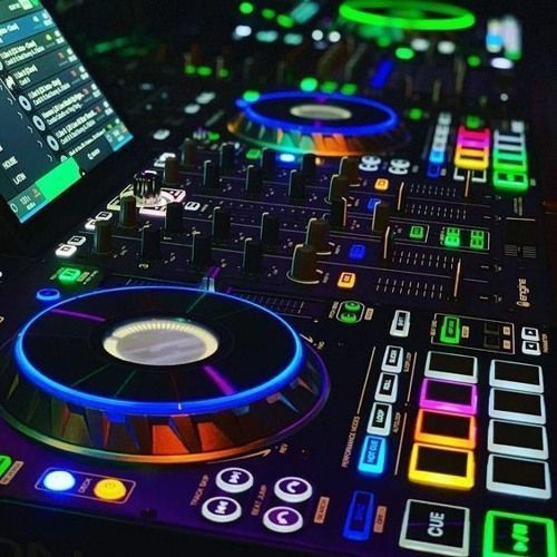 a dj's controller with colorful lights on it