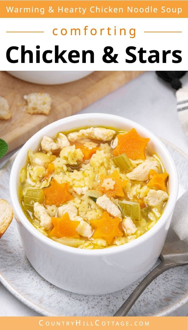 a white bowl filled with chicken and stars soup