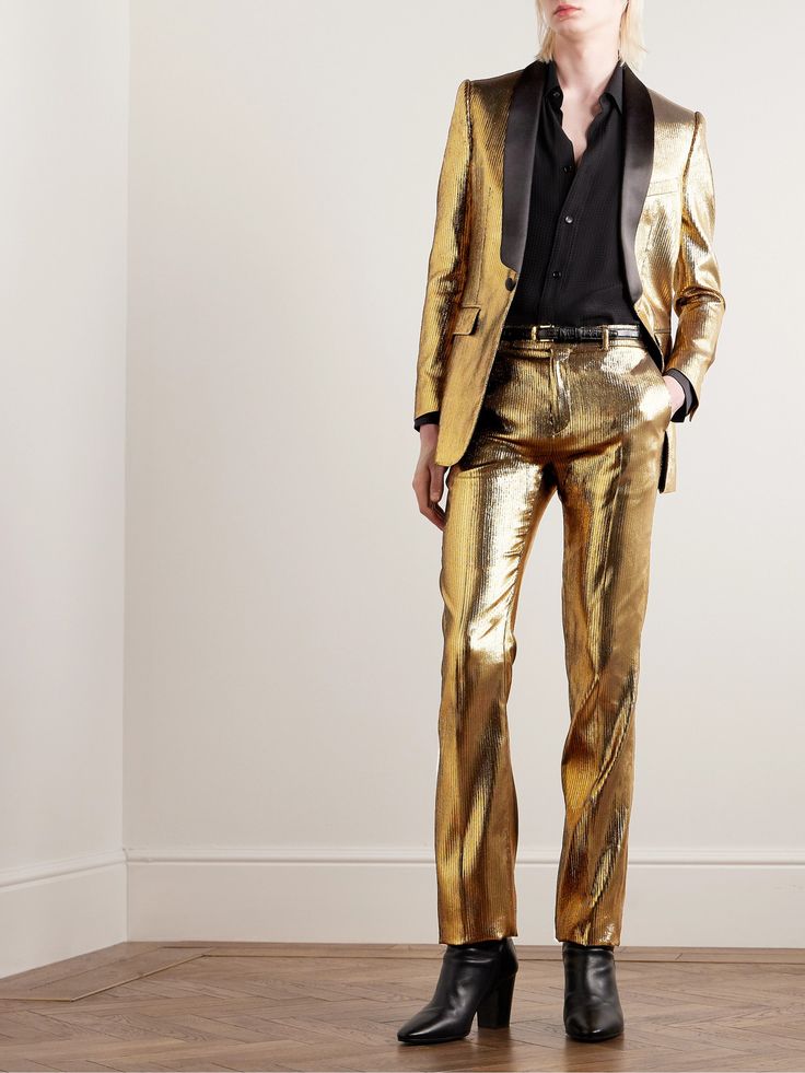 As noted in The Journal ; CELINE HOMME has produced "some of the most compelling – and widely imitated – clothes of recent years". This slim, gold lamé blazer, however, is one that’s going to be hard to beat. The black button and shawl lapels mean you could tie it in with tonal trousers or for the truly brave, style with the matching pair. Glam Poses, Gucci Jeans, Party Edit, Gold Suit, Blazer For Men, Brunello Cucinelli Men, Retro Glam, Rick Owens Men, Hedi Slimane