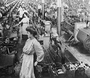 an old black and white photo of people working in a factory