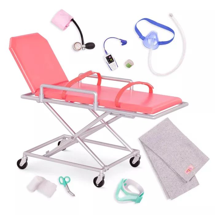 a hospital bed with medical supplies surrounding it