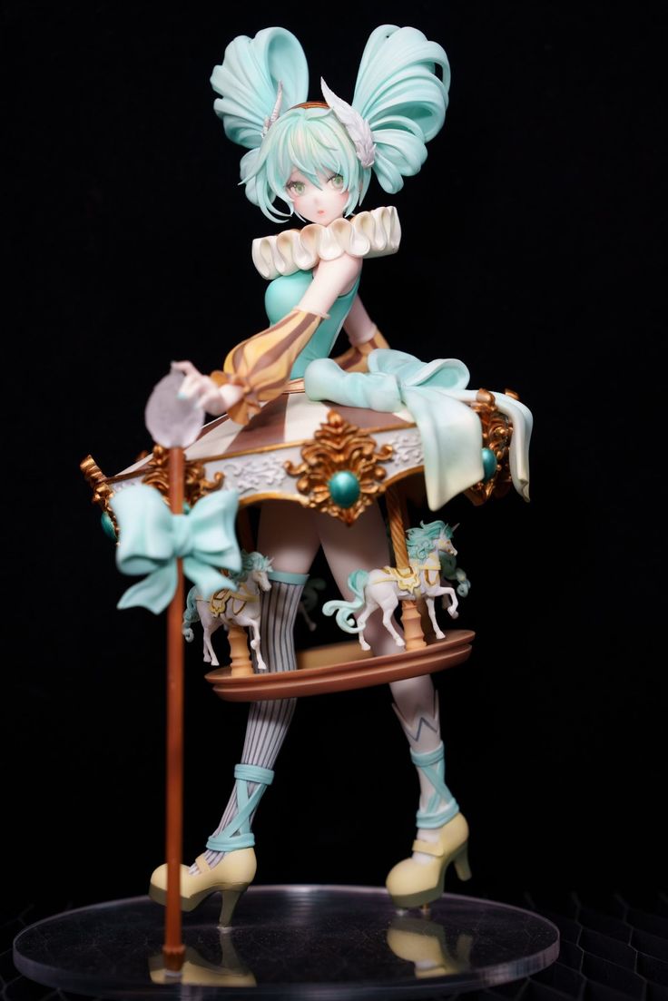 a figurine that is sitting on top of a chair with an umbrella in her hand