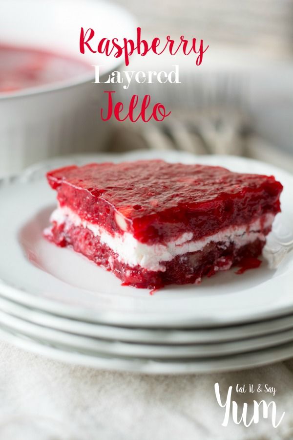 raspberry layered jello on a white plate