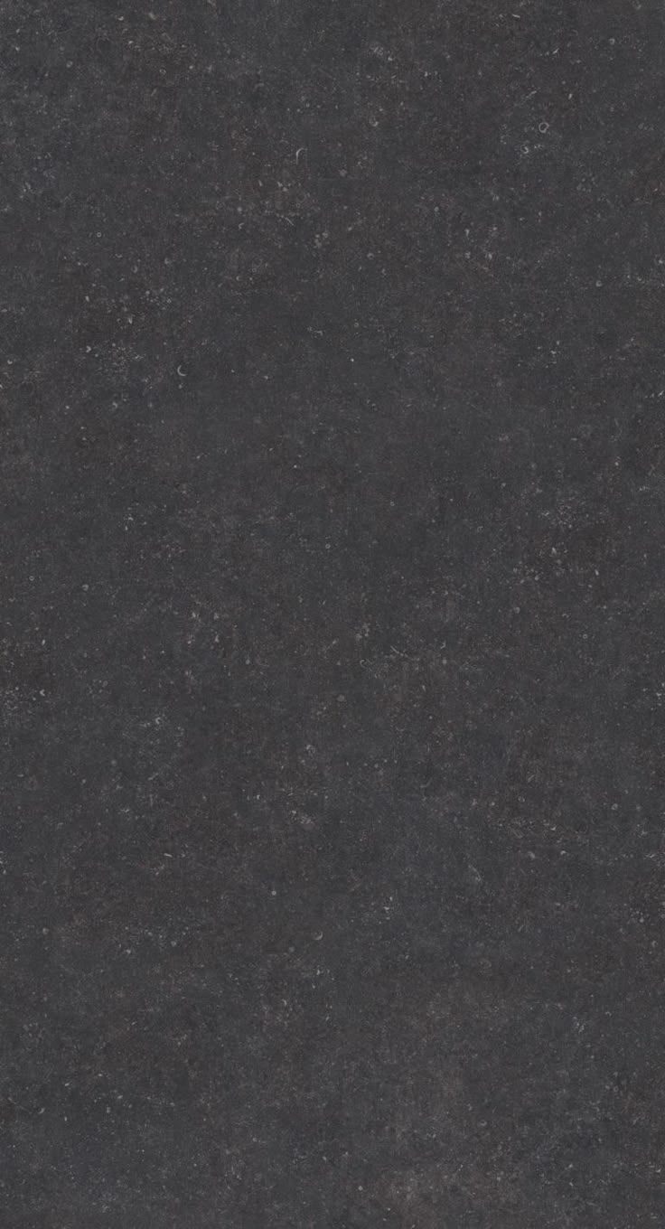 an image of a black marble surface that looks like granite