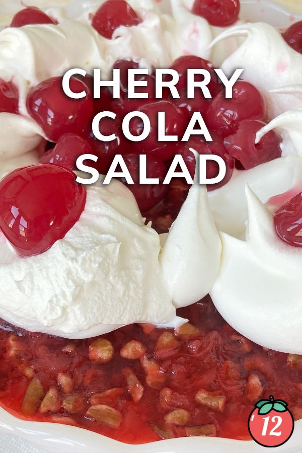 cherry cola salad with whipped cream and cherries on top