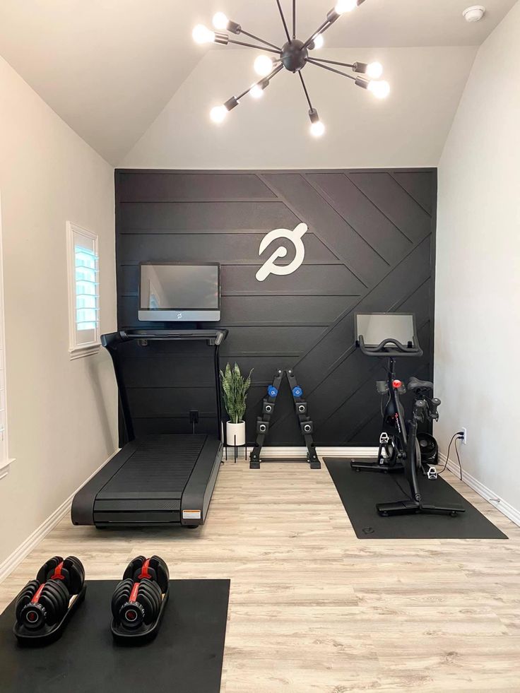 a home gym with exercise mats and treadmills