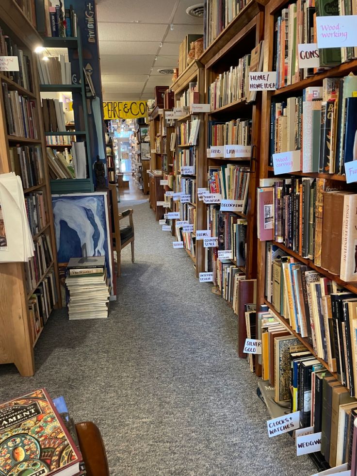 a library filled with lots of books on shelves