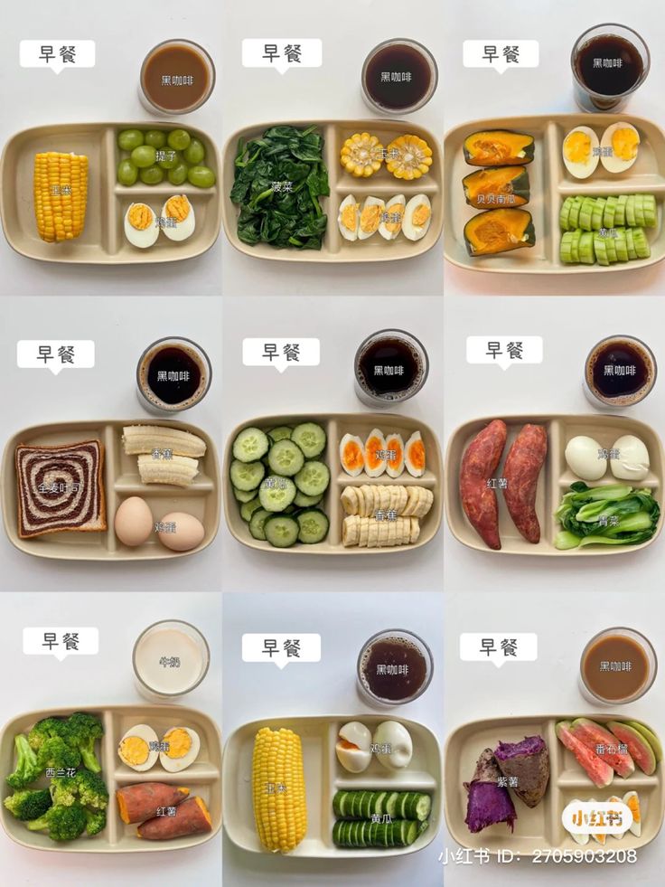 several different trays filled with various types of food and vegetables in each compartment, including eggs, broccoli, carrots, corn, peas, cucumber, and an egg