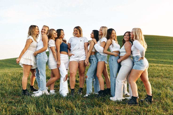 a group of young women standing next to each other