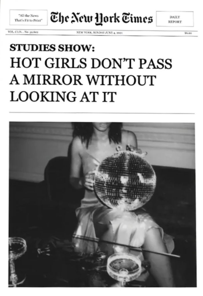 the new york times article features an image of a woman sitting in front of a mirror