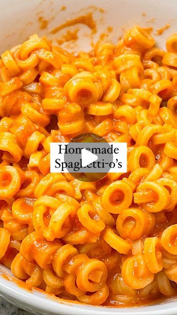 a bowl full of macaroni and cheese with the words homemade spaghetti's written on it