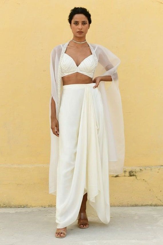 White Crop Top with Dhoti Pants and Attached Dupatta Set for women Indo Western dress Party wear Indian Dress Dhoti saree set Designer sari Satin Drape Skirt, Indo Western Dress Party Wear, Drape Lehenga, Organza Cape, Crop Top Blanc, Dhoti Saree, Blouse Satin, Sequence Blouse, Mehendi Outfits