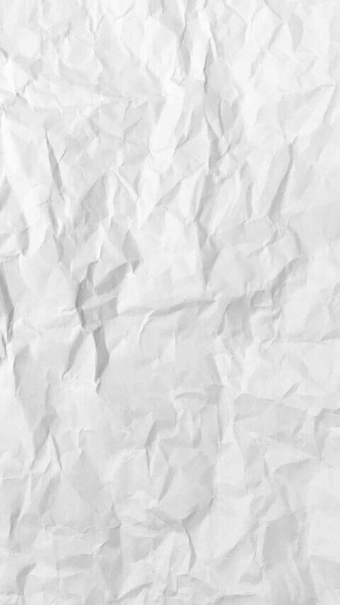 a white crumpled paper textured background