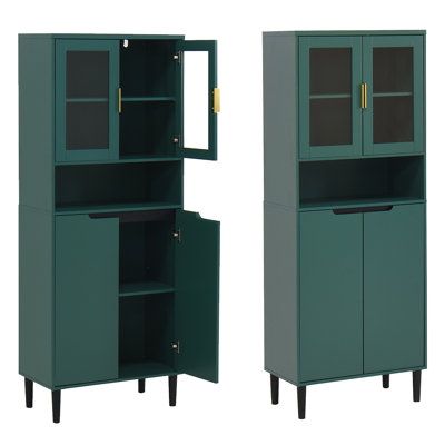 two tall green cabinets sitting next to each other