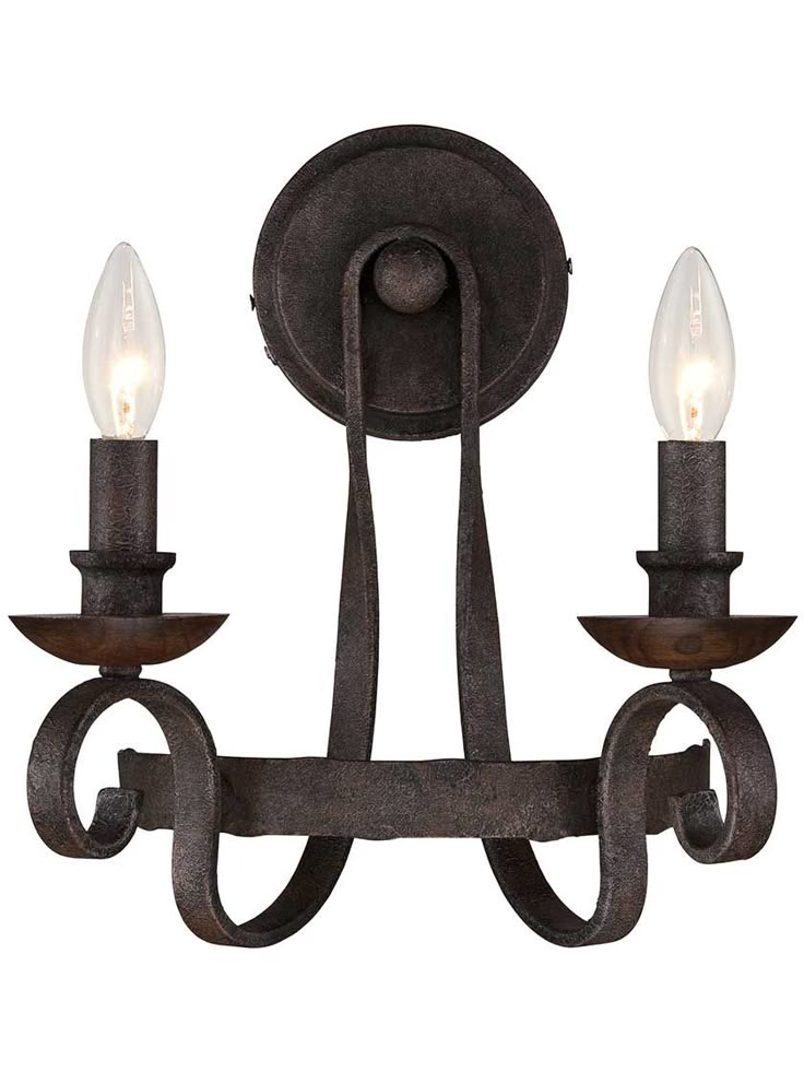 an iron chandelier with three lights on it