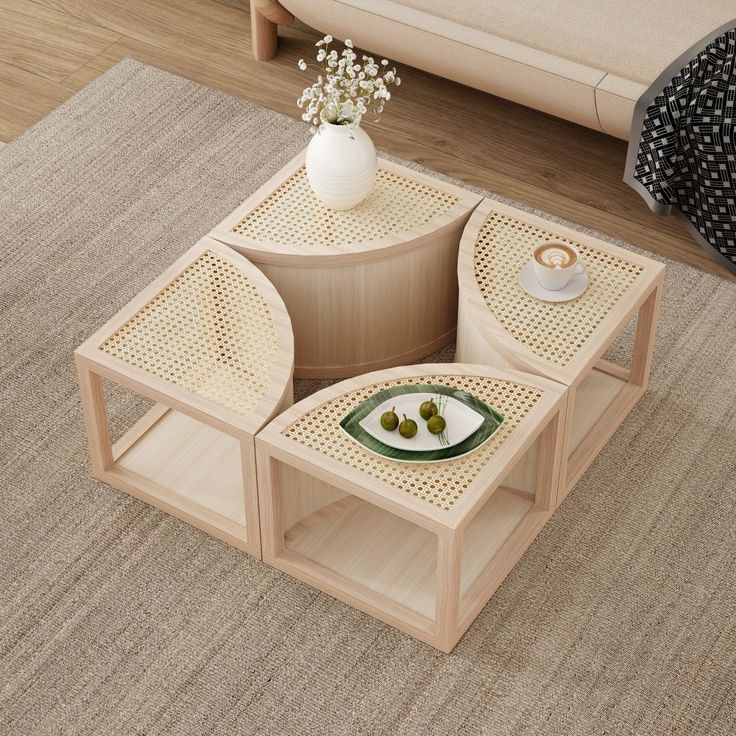 a coffee table with three pieces of furniture on it