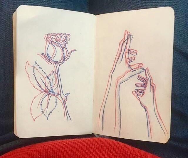 two drawings of hands holding flowers in each other's fingers, on top of a book