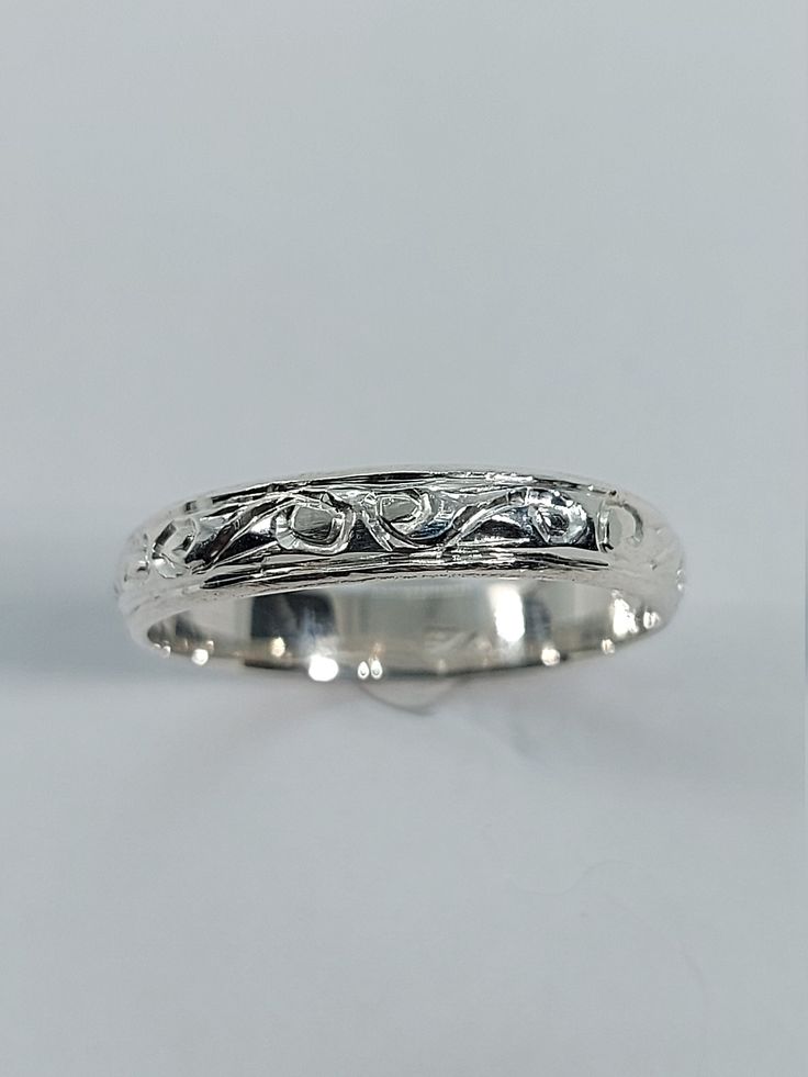 This stunning handmade/hand engraved unisex/any occasion band has been carefully crafted in solid 925 sterling silver. This beautiful band will not go unnoticed. Ring is size 8 1/2 but can be resized at no extra cost. A personalized message can be added to the inside of the ring such as your special date or any other message. All of my jewelry is handmade from scratch, one item at a time, as I like to produce a high quality piece. Ring will be shipped to you in an elegant gift box. A tracking sh Silver Ring Band, Silver Engraving, Engagement Bands, Silver Band Ring, Have A Blessed Day, Hand Engraving, Elegant Gift, Piercing Jewelry, Silver Band