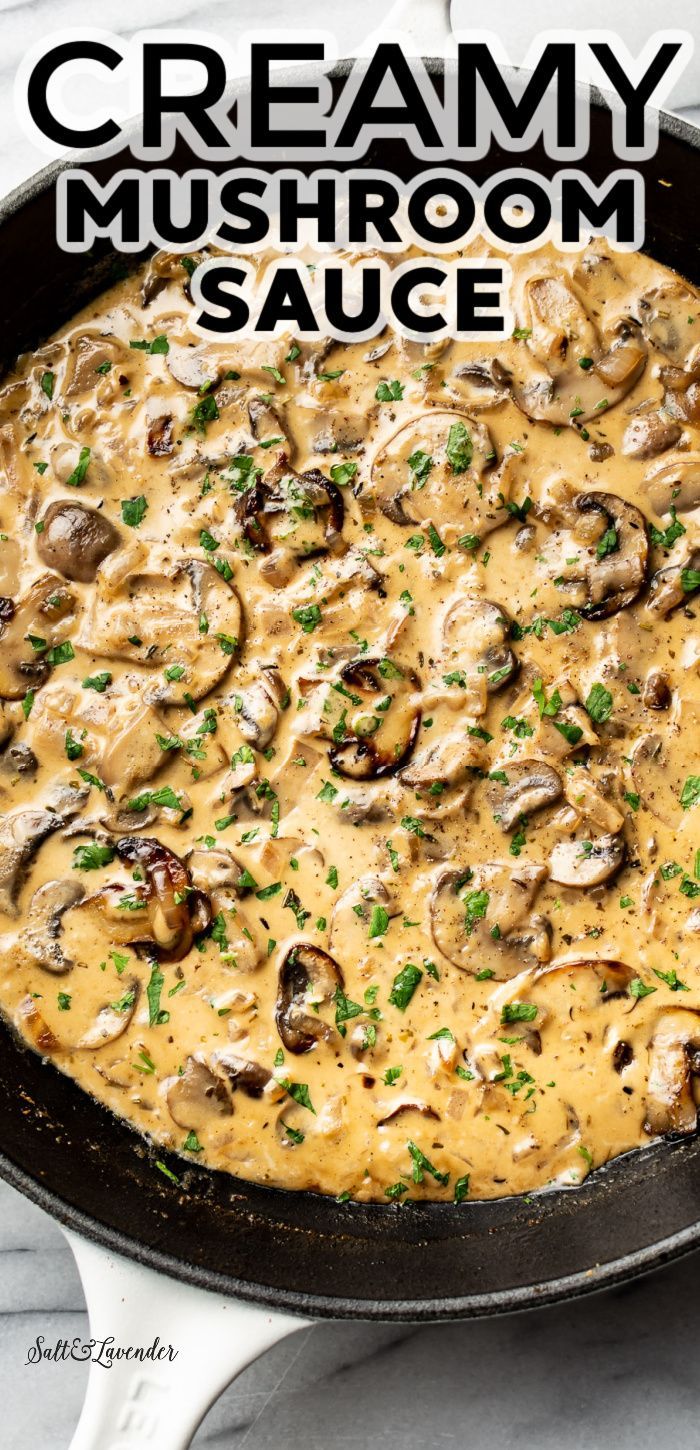 creamy mushroom sauce in a cast iron skillet with parsley on top and the title above it