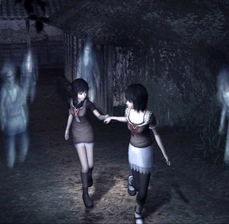 two women are walking in the dark holding hands