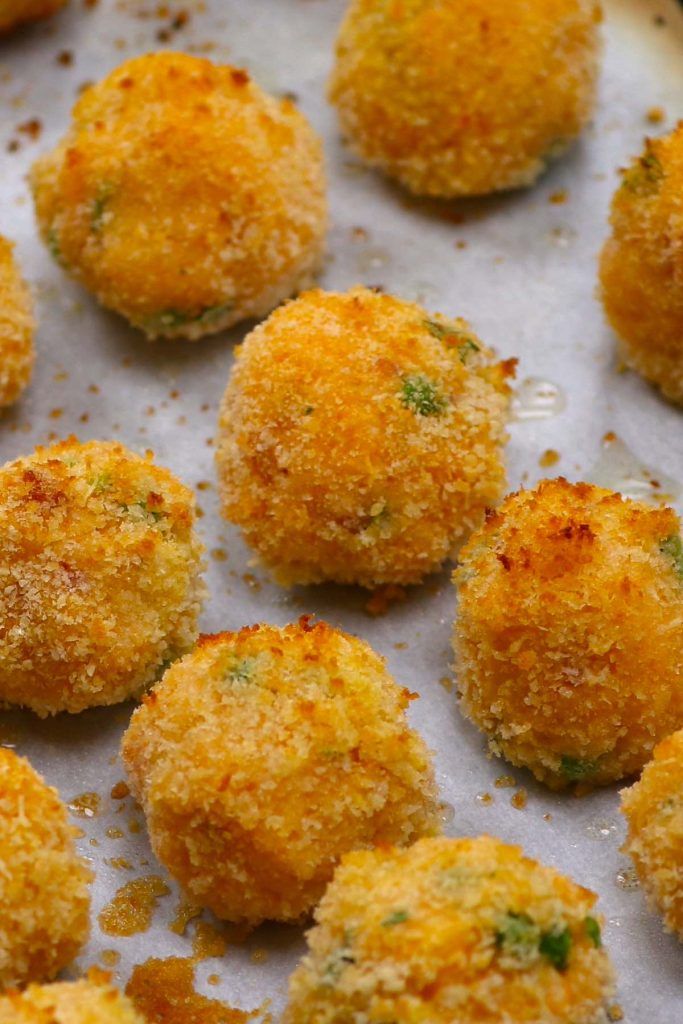 some food that is sitting on a baking sheet and ready to be cooked in the oven