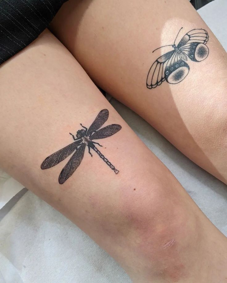 two tattoos on the legs of people with dragonflies