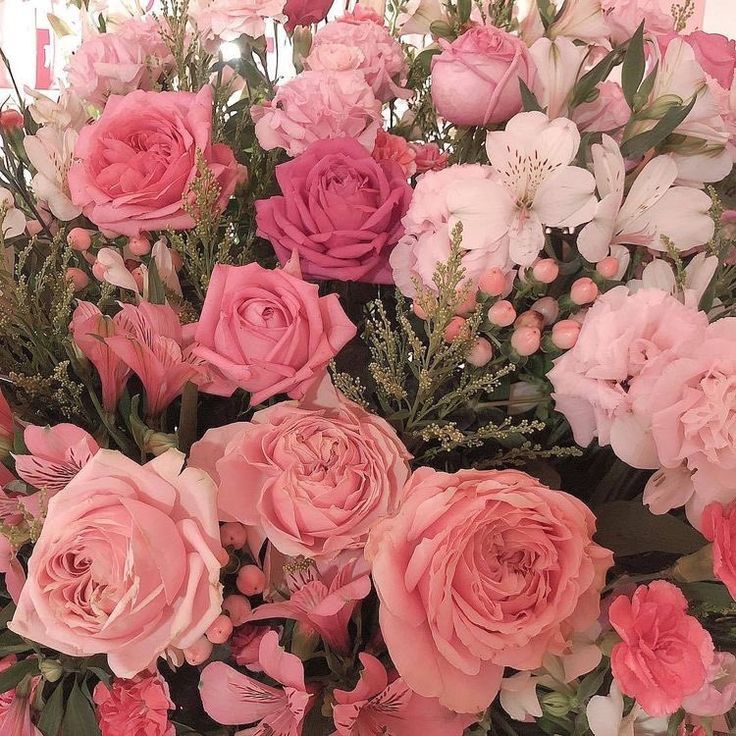 a large bouquet of pink and white flowers