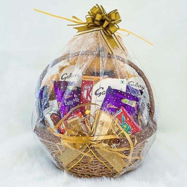 a basket filled with chocolates and candy bars