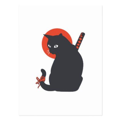 a black cat sitting on top of a white wall next to a red ball and a knife