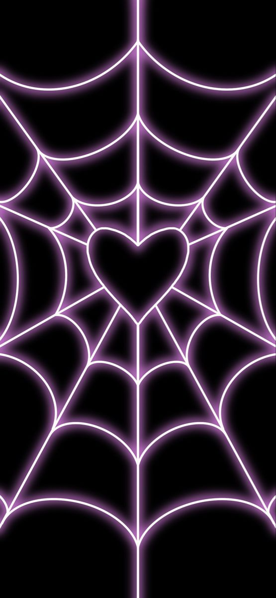 a spider web with a heart in the center