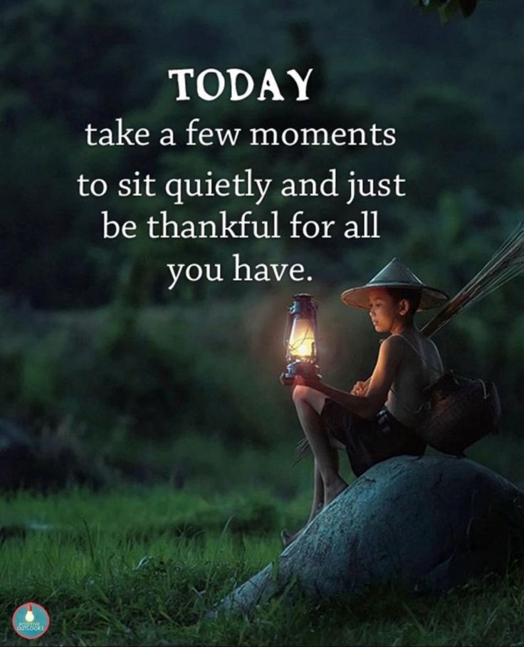 a little boy sitting on top of a rock holding a lantern in his hand with the caption, today take a few moments to sit quietly and just be grateful for all you have