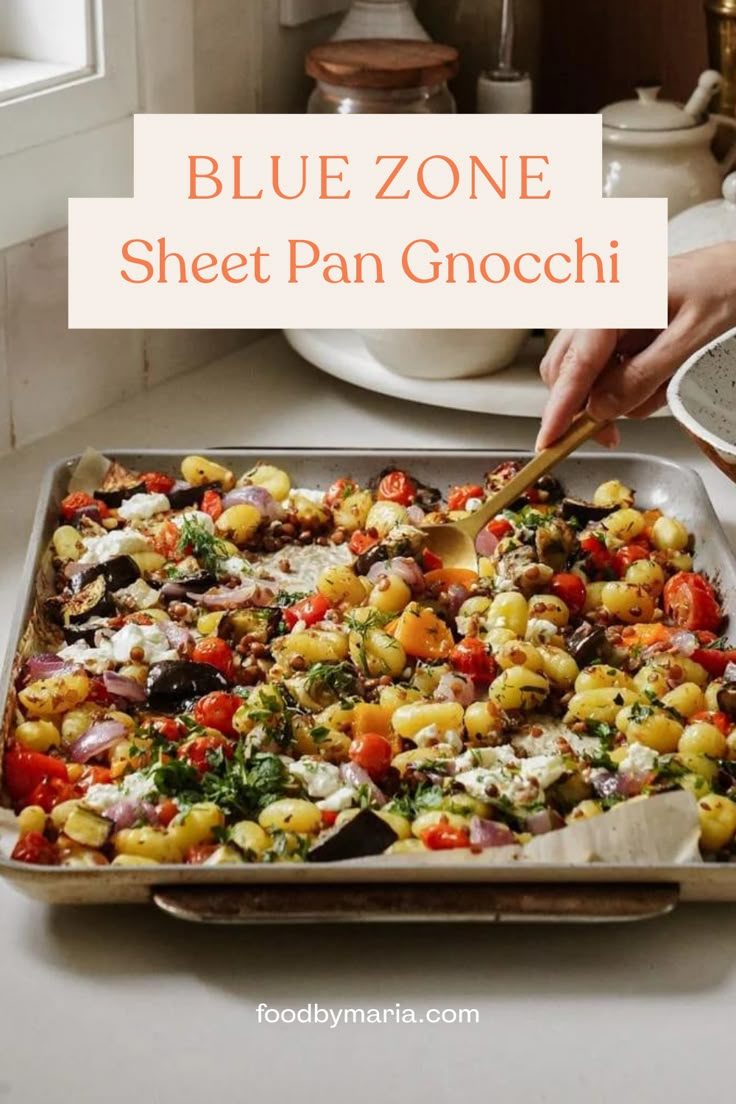 blue zone sheet pan gnocchini with tomatoes and spinach on the side