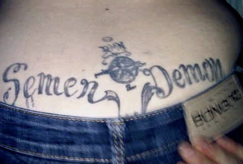 the back of a woman's stomach with her name written on it