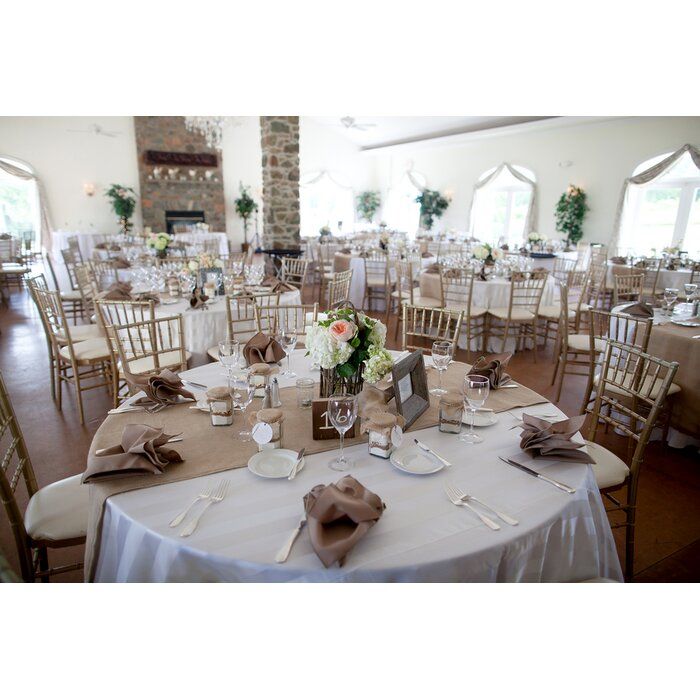 tables and chairs are set up for a wedding reception at the inn on main street