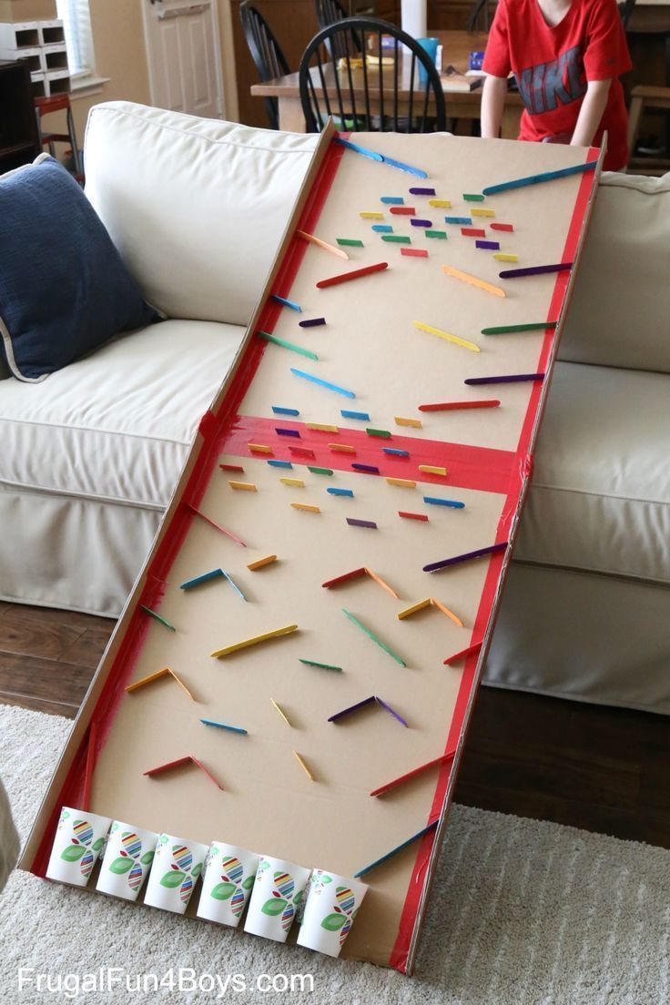 the cardboard board is made to look like it's being played with colored pencils