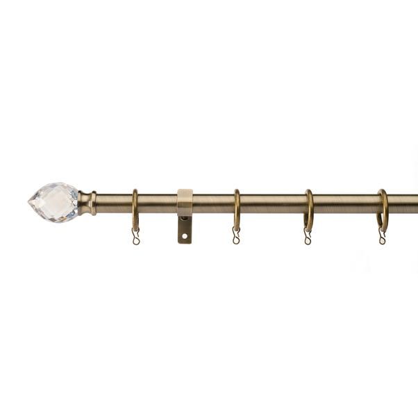 an image of a metal curtain rod with crystal glass knobs on it's end