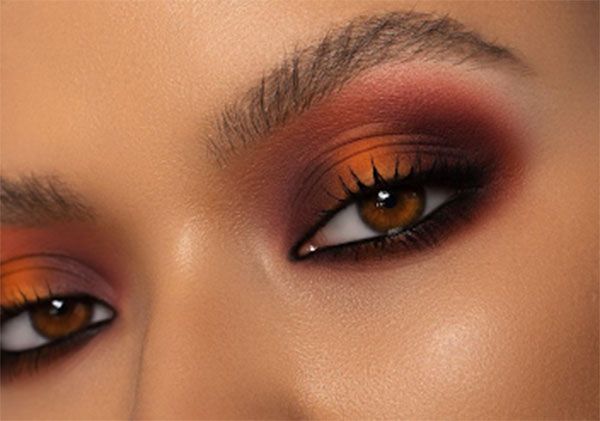 Fall Goddess Makeup, Velma Eye Makeup, Wild West Eyeshadow Looks, Bold Fall Makeup, Orange Black Eyeshadow, Fall Eyeshadow Looks 2023, Fall Makeup Brown Skin, Fall Inspired Makeup Looks, Dark Orange Makeup