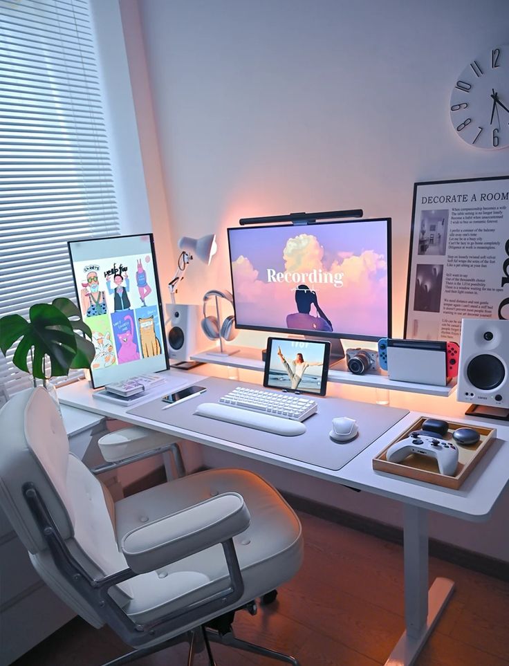 a white desk topped with two computer monitors