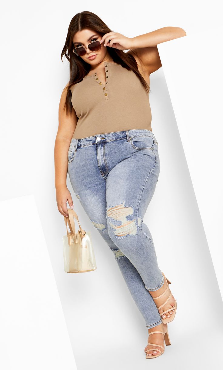 Create gorgeous ensembles with the curve-flattering silhouette of our Asha Jojo Jean! Featuring distressed detailing, a classic five pocket denim styling and Signature Chic Denim hardware, these jeans are fabulously timeless for your wardrobe! Key Features Include: - Asha: the perfect fit for an Apple body shape - High rise, single button and fly fastening - Belt looped waistband - Classic five pocket denim styling - Skinny leg - Crop length - Distressed detailing - Stretch denim fabrication - H Ankle Heel Boots, Denim Styling, Apple Body Shape, Model Jeans, Apple Body Shapes, Denim Chic, Curvy Model, Ankle Heels, Plus Size Jeans