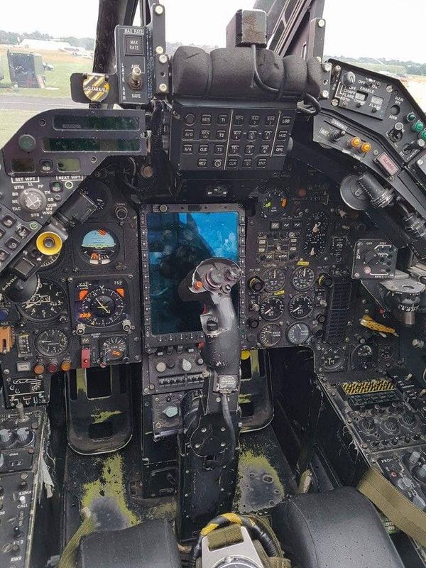 the cockpit of an airplane with multiple controls